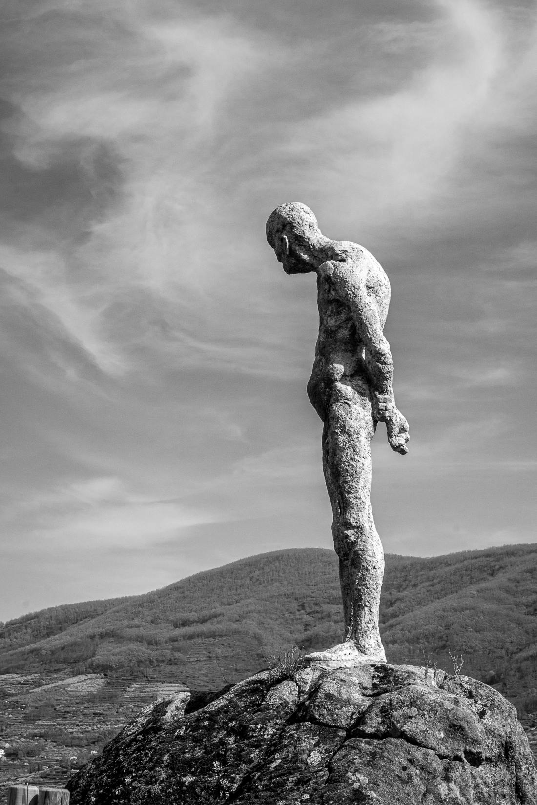 Photo by Juan García: https://www.pexels.com/photo/imposing-stone-sculpture-against-mountain-landscape-31646172/
