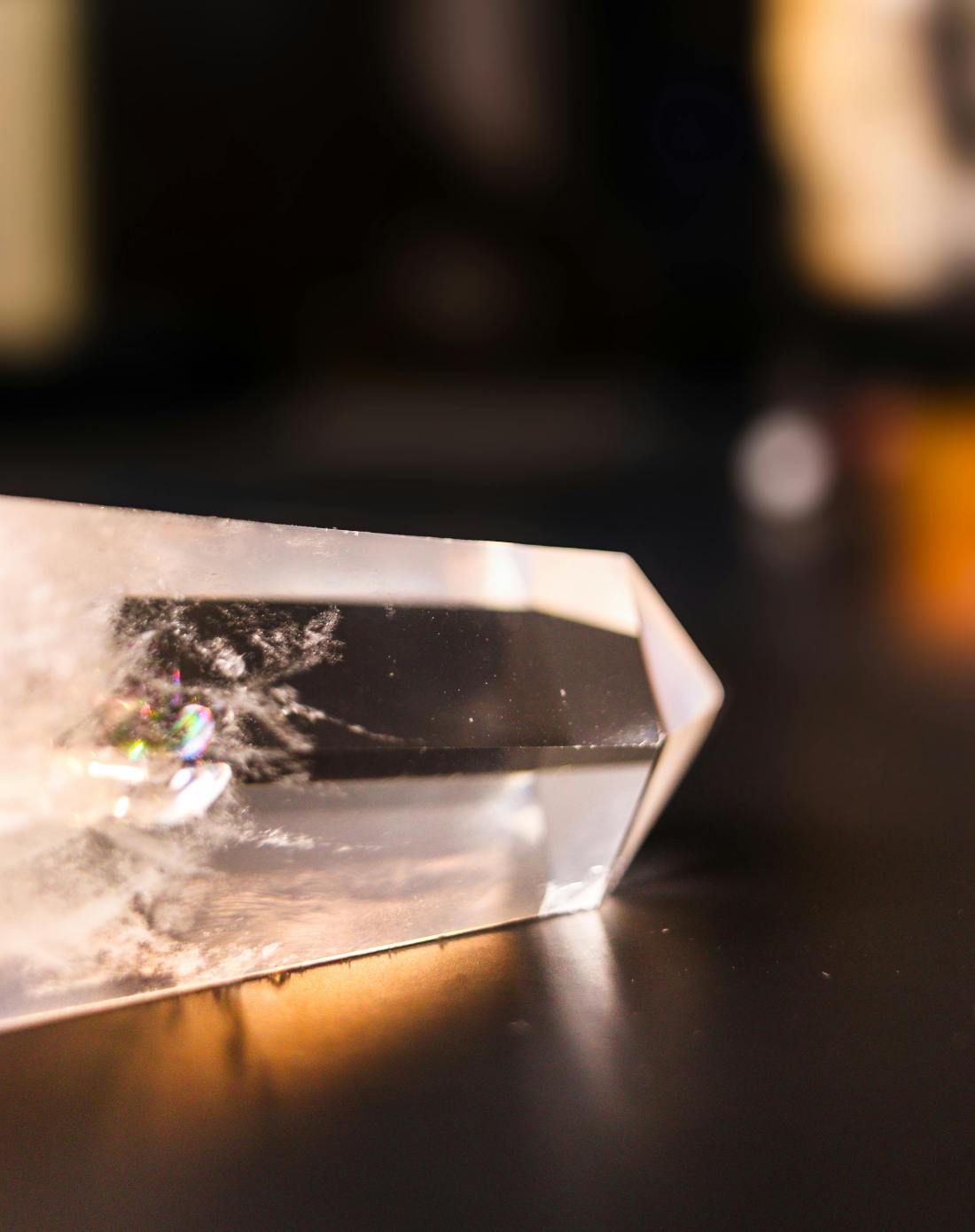 Photo by Mr. Pugo: https://www.pexels.com/photo/close-up-of-clear-quartz-crystal-on-dark-surface-35451967/