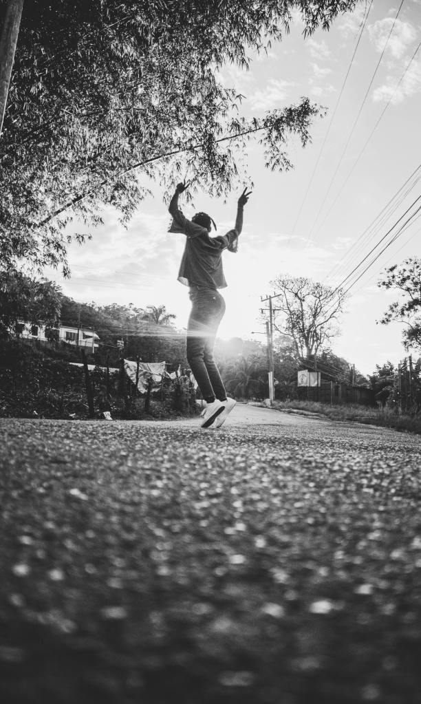 Photo by Aviz Media: https://www.pexels.com/photo/unrecognizable-teenager-jumping-on-park-alley-4336962/