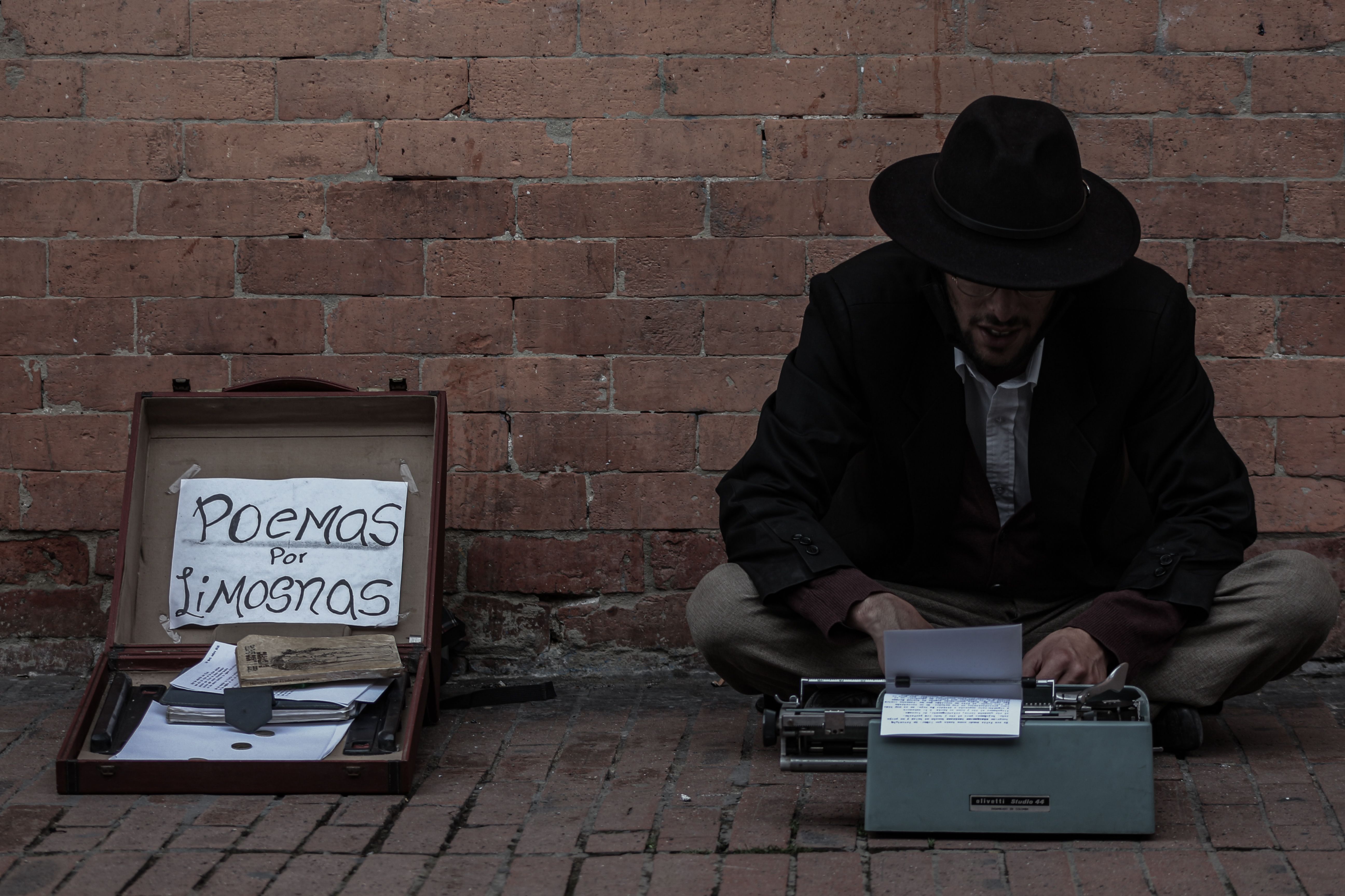 Photo by José Nicolás  Castellanos Ramírez: https://www.pexels.com/photo/man-using-typewriter-while-sitting-on-floor-13789221/