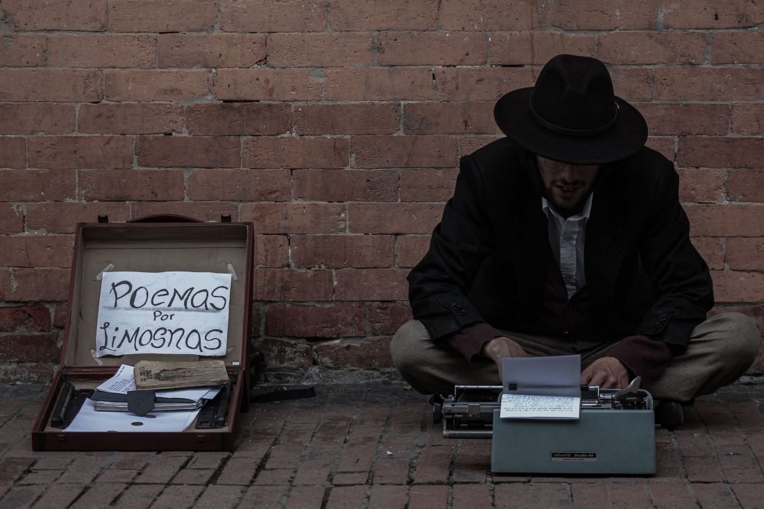 Photo by José Nicolás Castellanos Ramírez: https://www.pexels.com/photo/man-using-typewriter-while-sitting-on-floor-13789221/