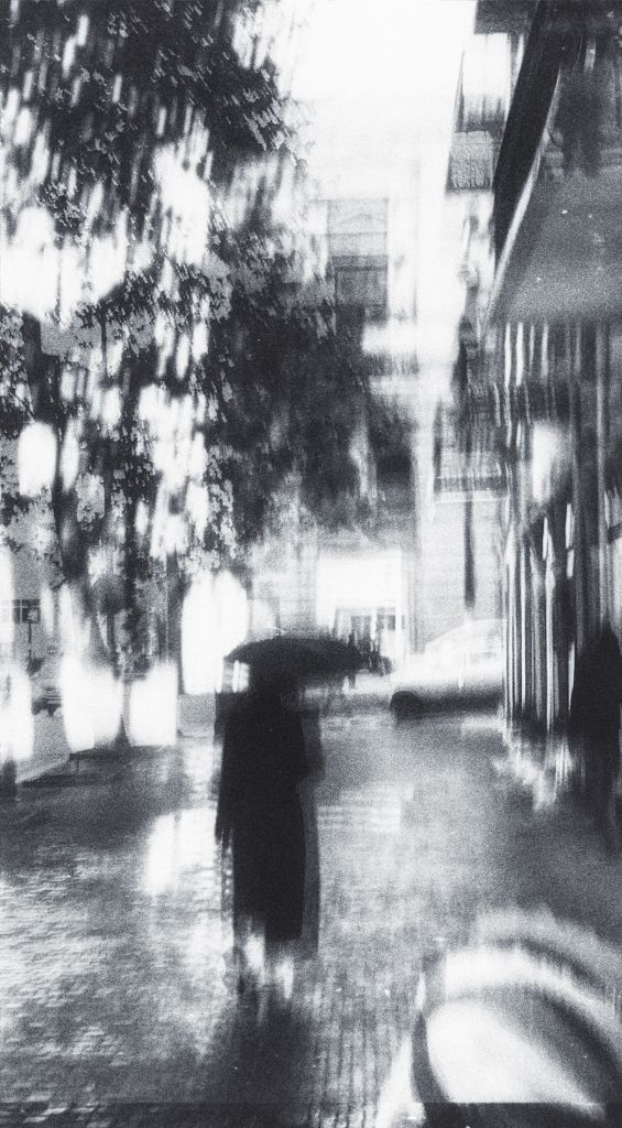 Photo by Narmin Aslanli: https://www.pexels.com/photo/monochrome-rainy-street-with-blurred-silhouette-29705459/