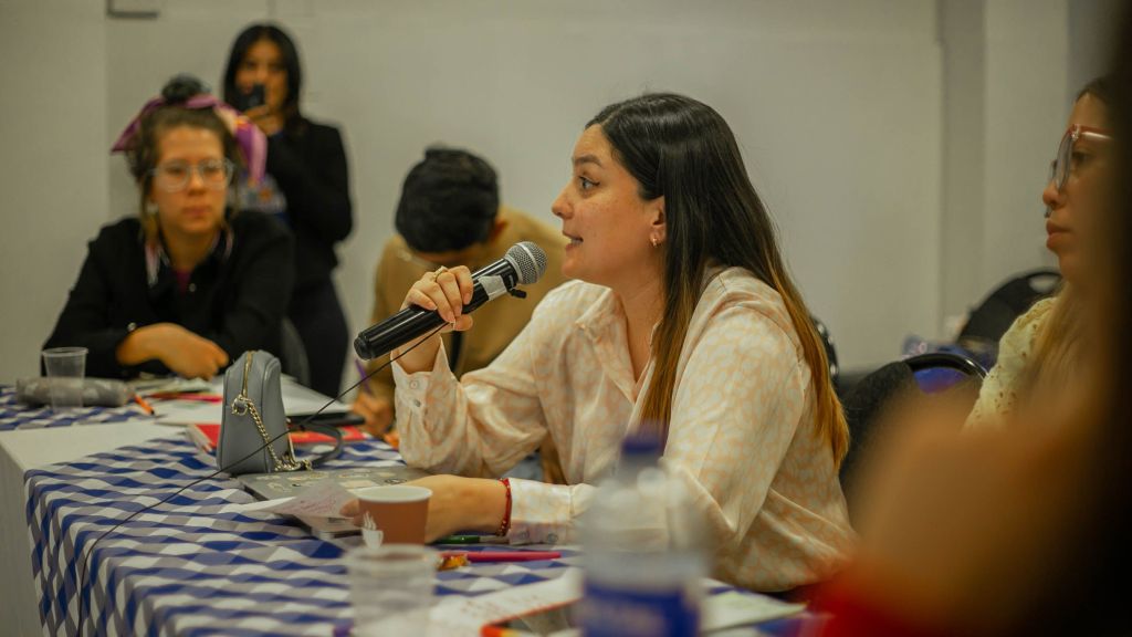 Photo by Stiven Rivera: https://www.pexels.com/photo/young-woman-sitting-at-a-table-and-speaking-on-a-microphone-17558082/